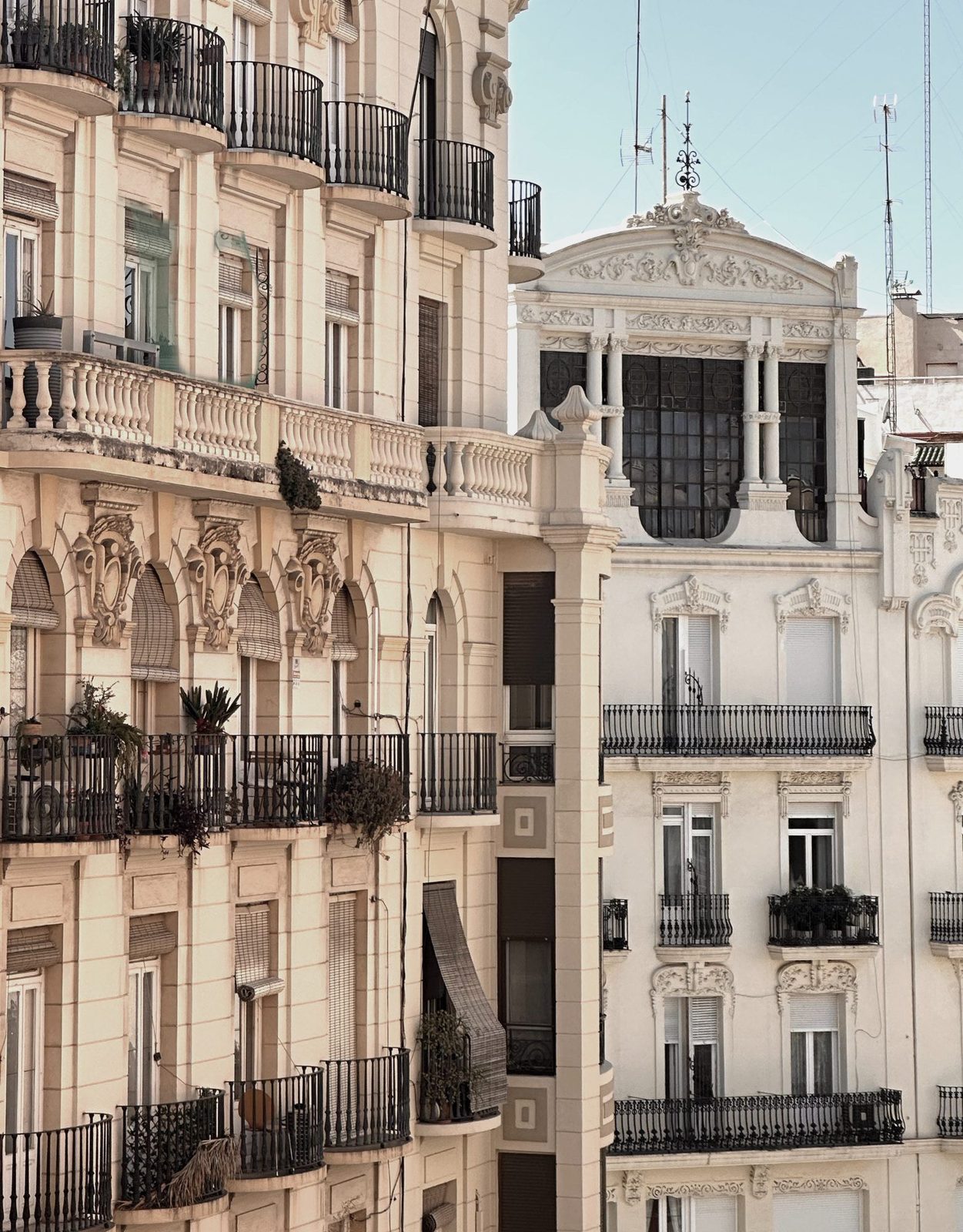Art Nouveau facades with wrought-iron balconies