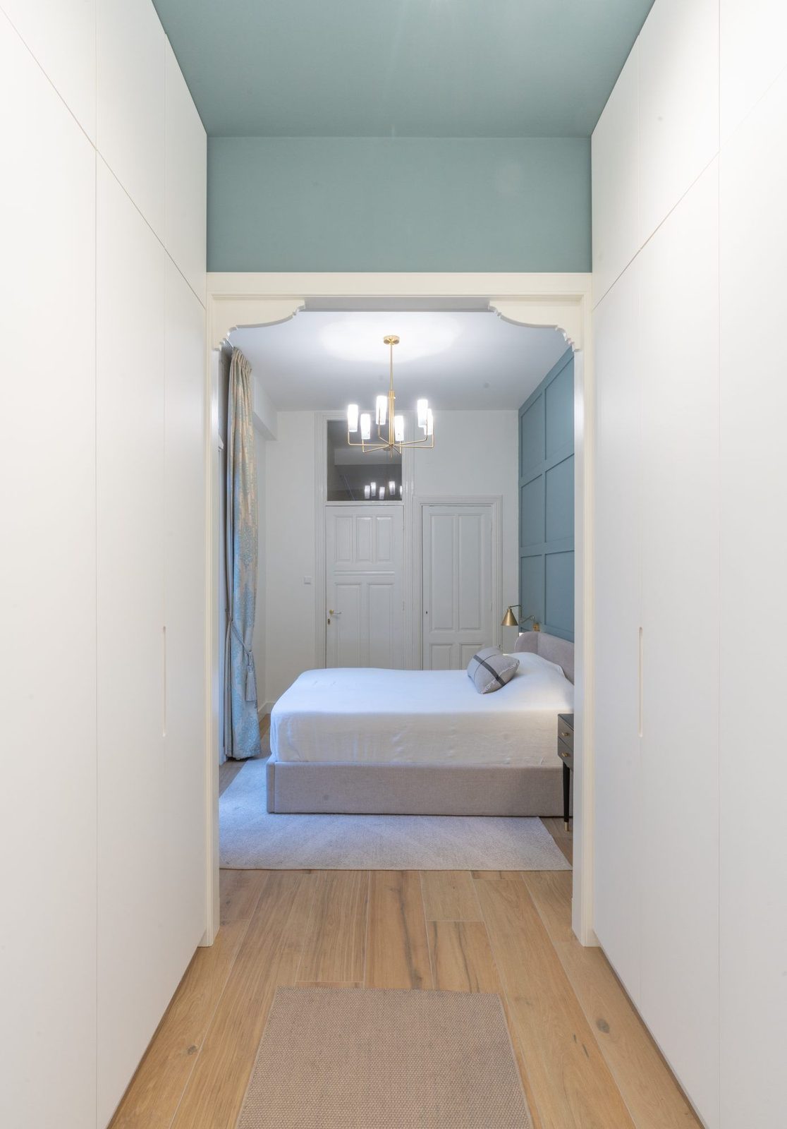 Wardrobe passage leading to the bedroom through the original arch